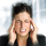 Businesswoman,With,Intense,Stress,And,Painful,Headache.,Woman,In,Job